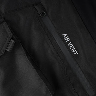 Close-up of the trouser's large cargo pocket, showing the vertically placed zippered opening labeled "AIR VENT" and the pocket's closure flap.