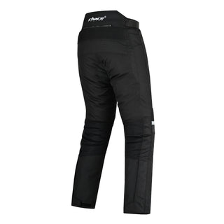 Angled rear view of the black textile trousers, showing the contoured cut of the leg, the lumbar stretch panel, and the lower leg adjustment strap.