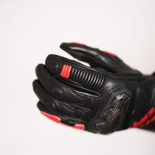 Close-up of the Terra glove being worn and flexed, demonstrating the mobility provided by the accordion stretch panels over the finger knuckles and the robust main protector.