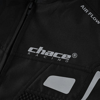 Close-up of the jacket's chest area, prominently featuring the reflective "Chace Racing" logo, the phrase "AIR FLOW SYSTEM," and a reflective accent panel.